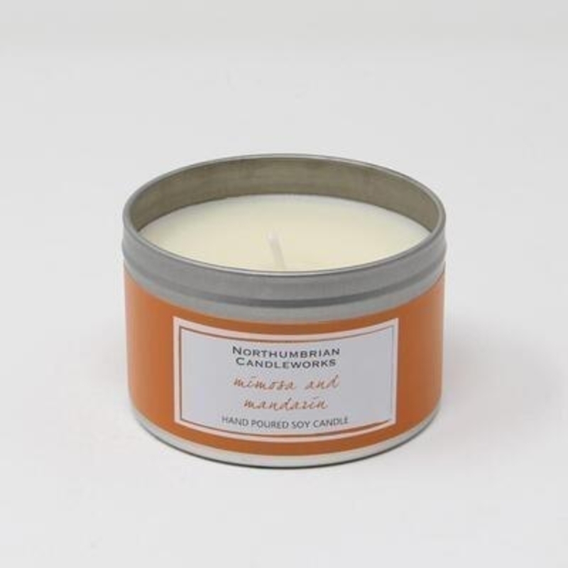 Northumbrian Candleworks Mimosa Mandarin Soy Candle Tin Enjoy the subtle combination of citrus and sweet creating a sensationally summery scent transporting you to the Spanish province of sunny Seville with beautiful Mimosa and Mandarin. The large candle tin really does look as good as it smells and will sit beautifully on a shelf or coffee table or window sill. The choice is yours.